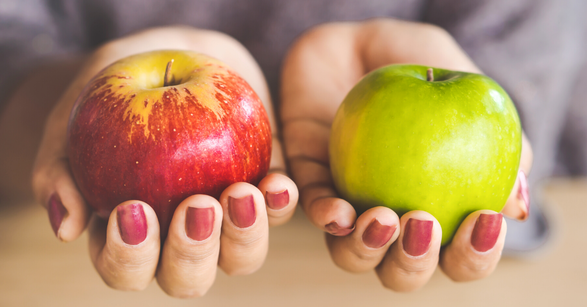 Comparing a red apple with a green apple