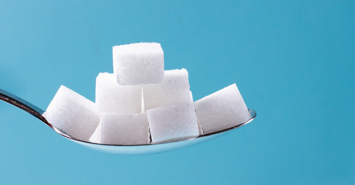 Spoon full of sugar cubes