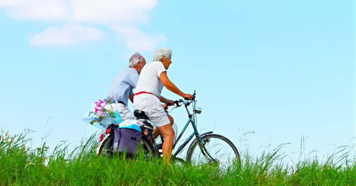 Older couple riding bicycles