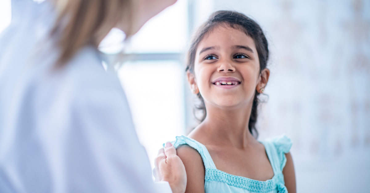 Doctor talking with a child