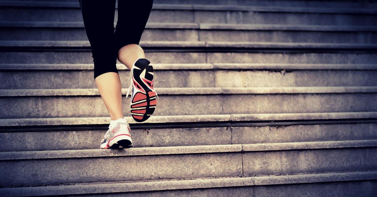 Woman exercising on stairs