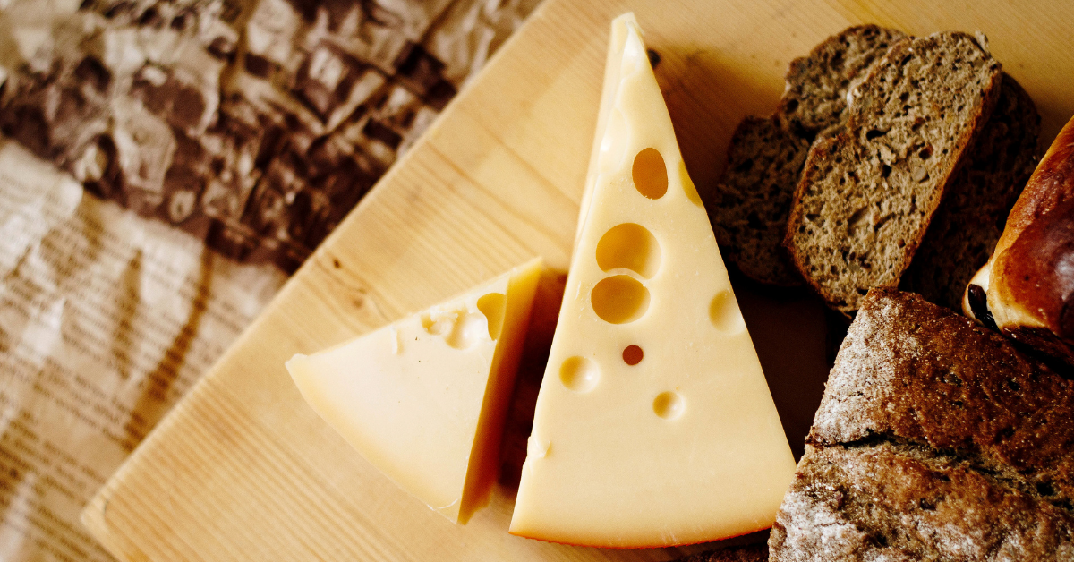 Cheese and bread on a cutting board