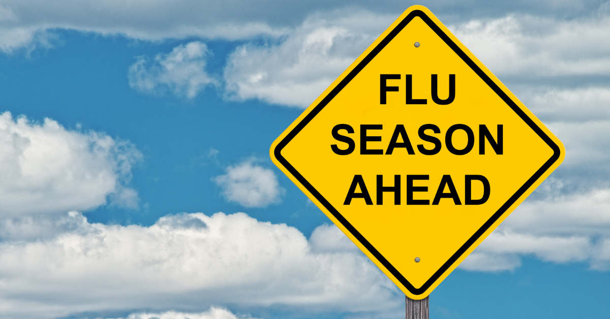 Road sign reading FLU SEASON AHEAD