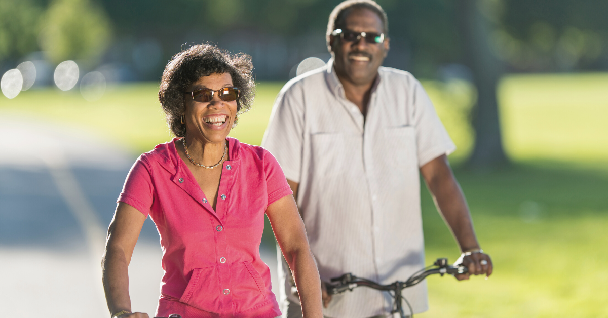 Middle-aged couple riding bikes