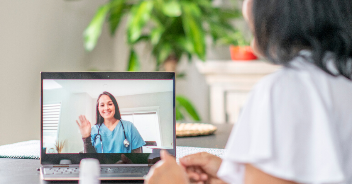 Patient speaking with a doctor on a laptop